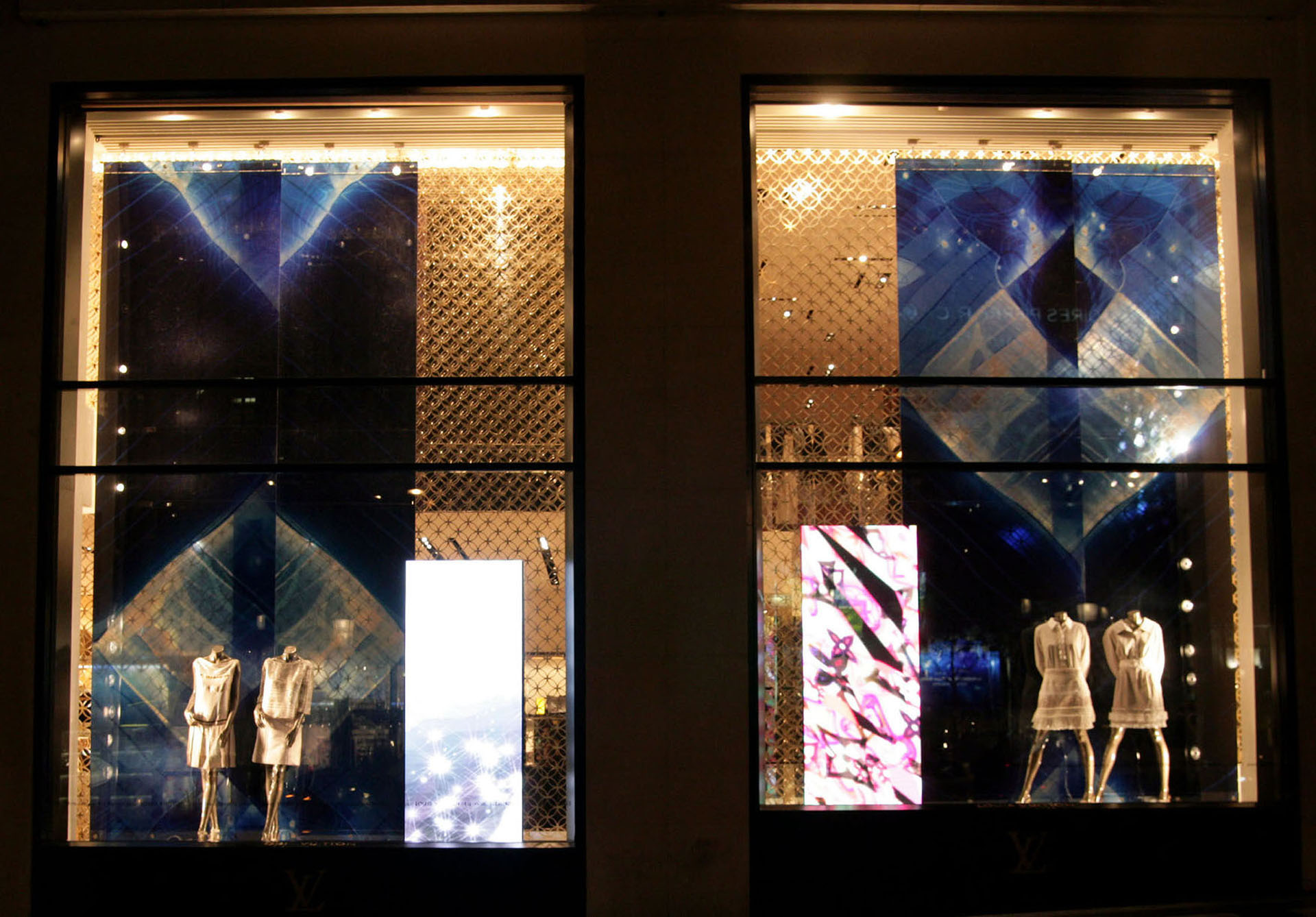 "Alpha" - Fiber-optic video installation, Louis Vuitton, Paris. 20-meter-long video wall alongside the "traveling staircase" (escalator) in the Louis Vuitton new headquarters on Champs-Élysées, was a breakthrough in video high definition technology in 2005. The wall displayed endlessly changing compositions on the subject of four seasons; living logos of Louis Vuitton design appeared as nature's creations throughout the artwork. The idea of traveling in time (while on a "traveling staircase" and surrounded by the images of the eternally changing and remaining in tact product design), was successfully implemented.